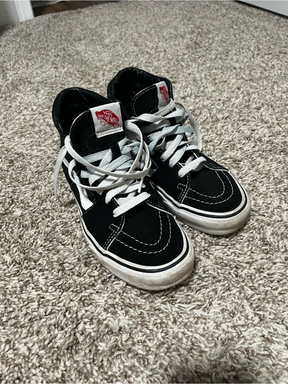 Vans Black and White High-Top Sneakers